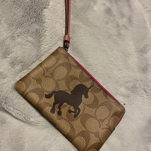 Coach wristlet with unicorn